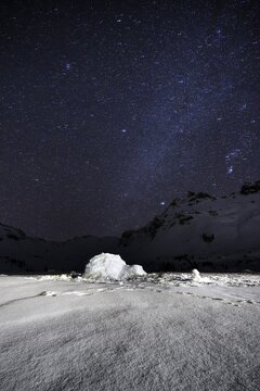 Igloo, Starry sky with milky way in the mountains in winter, Wattentaler Lizum, Tuxer Alps, Tyrol, Austria