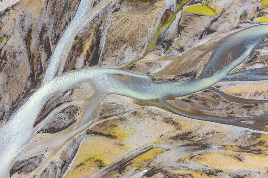 Blue river arms flowing through lava sand, meandering river from above, Affr&eacute;tis&aacute; river, Icelandic highlands, aerial view, &THORN;akgil, Iceland