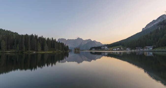 Lake Misurina at sunset, behind medical clinic Istituto Pio XII, Sorapis mountain group, Dolomites, South Tyrol, Bolzano, Italy