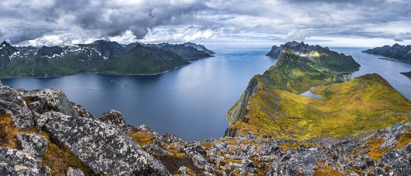Mountain panorama, fjord and mountains, in the back Fjordgard and mountain Segla, view from mountain Barden, Senja, Norway