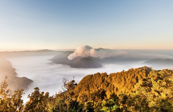 Mount Bromo, sunrise, volcano in clouds, Mount Batok, Mount Kursi, Mount Semeru, Bromo Tengger Semeru National Park, Java, Indonesia