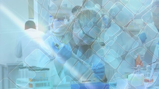 Scientist picking up pipette, repeating transfers into blue rack for assay diamond overlaying bench