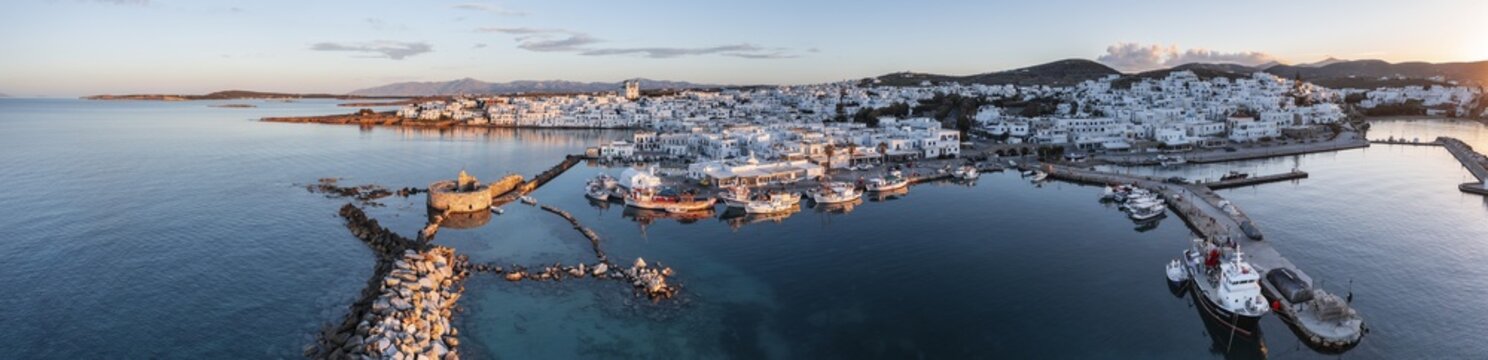 Evening atmosphere, aerial view, town view and harbour of Naoussa, harbour wall with Venetian ruins, Paros, Cyclades, Greece