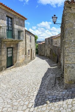 Narrow cobbled street in the medieval mountain village of Sortelha, Serra da Estrela, Beira Alta, Portugal