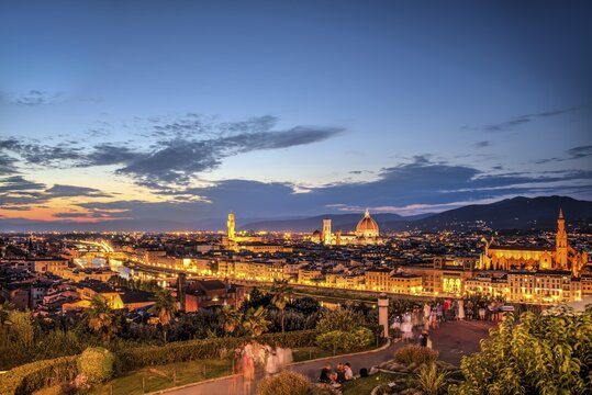 Lookout platform at Piazzale Michelangelo, illuminated city panorama at dusk with Florence Cathedral, Cathedral of Santa Maria del Fiore, Palazzo Vecchio, Ponte Vecchio, UNESCO World Heritage Site, Florence, Tuscany, Italy
