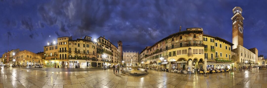 360&deg; panorama of the city square Piazza delle Erbe and former Roman Forum with fountain Fontana Madonna Verona and the medieval tower Torre dei Lamberti in the evening, Piazza Erbe, Verona, Veneto, Italy