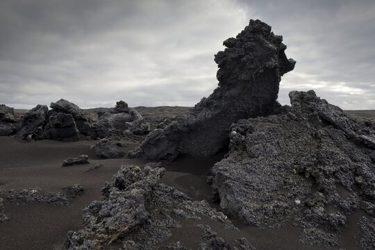 Black sand and piled up lava, Reykjanesskagi, Southern Peninsula or Reykjanes, Iceland