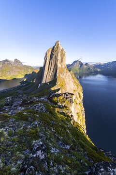 Steep mountain Segla, fjord Mefjorden with mountains, island Senja, Troms, Norway
