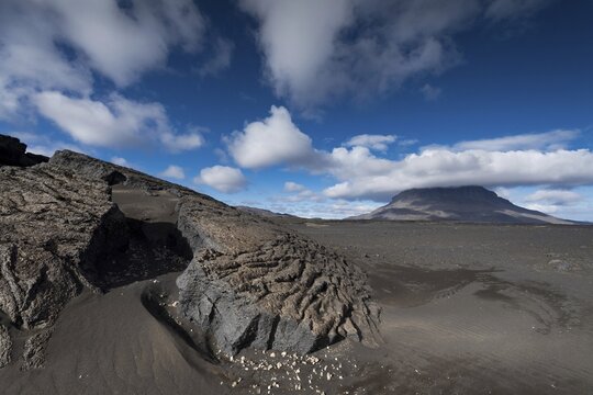 Solidified lava, lava desert, in the background table volcano Her&eth;ubrei&eth; or Herdubreid, Icelandic highlands, Iceland