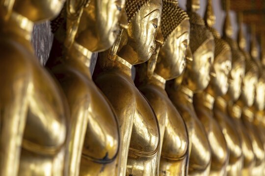Gilded Buddha statues (Bhumispara-mudra: Buddha Gautama at the moment of enlightenment), Wat Suthat Thepwararam, Royal Temple, Phra Nakhon, Bangkok, Thailand