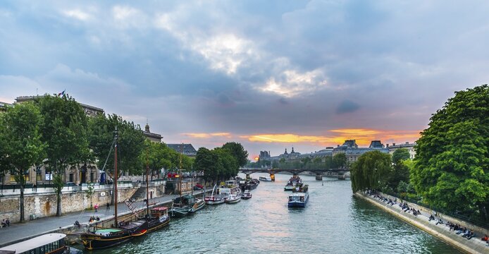 View over Seine River, boats, sunset, Paris, Ile-de-France, France