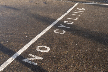 Fototapeta premium No cycling road marking painted on asphalt surface