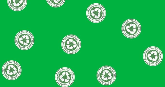 Recycle symbol on multiple round banners falling against black background