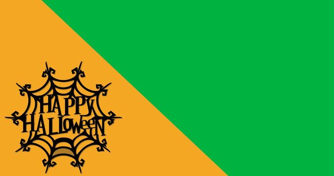 Digital animation of happy halloween text banner against yellow and black dual tone background