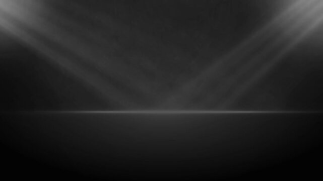 The studio background is black with smoky light.