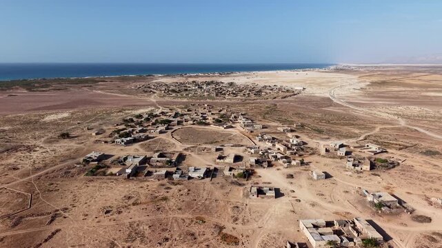 Aerial coastal desert village view