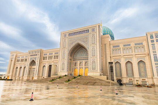 Final stage of construction of the Center for Islamic Civilization under construction before its  opening beneath a cloudy sky.