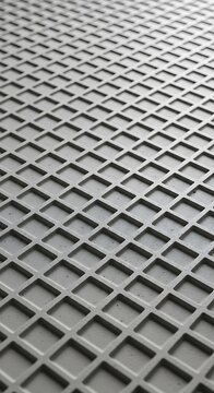 Detailed close-up of a gray diamond grid pattern.