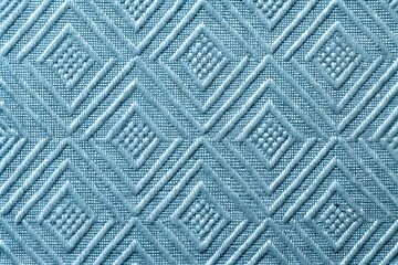 Fototapeta premium Natural Light Blue Embossed Geometric Diamond Pattern Fabric Texture Background