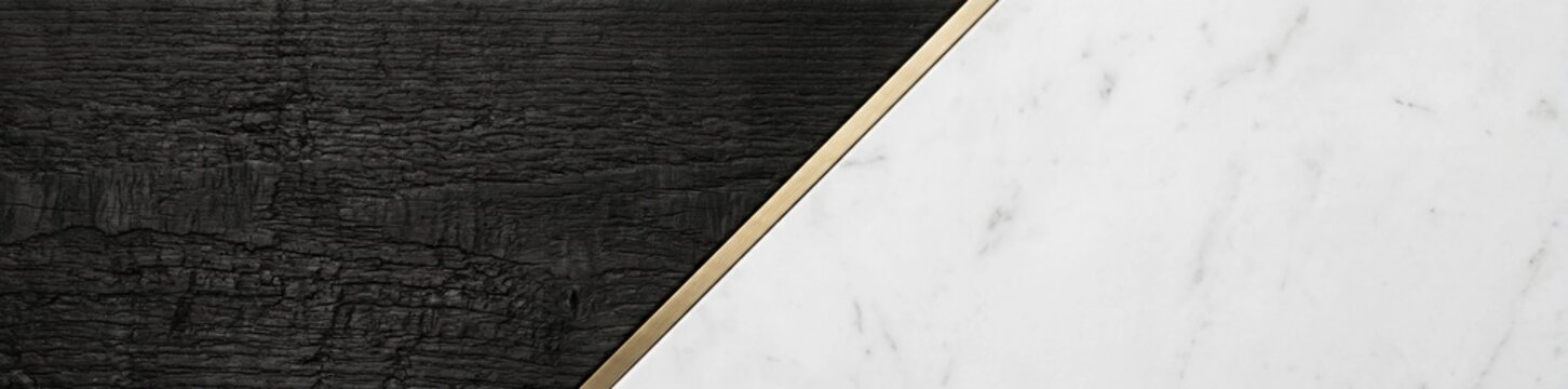 Abstract close-up of a diagonally divided surface with one half featuring a dark, textured, wood-grain pattern and the other half showcasing a smooth, white marble texture