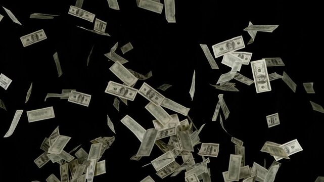 Super slow motion of flying US dollars banknotes on black background. Filmed on high speed cinema camera, 1000fps.