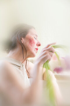 Portrait of a woman in high key with slow exposure effects III