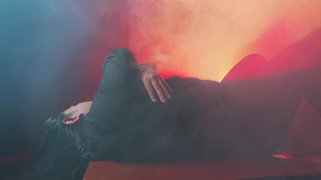 Dramatic Silhouette in Colorful Smoke