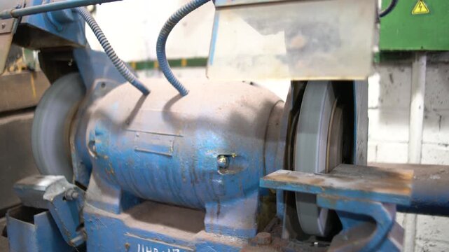 Grinding sharpening machine in a workshop idling