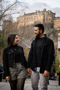 Couple Walking Together Down The Vennel Steps in Edinburgh