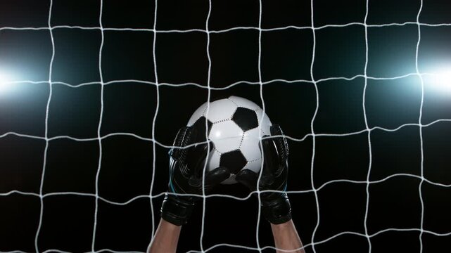 Close-up of Soccer Ball Hitting Goal Net, Super Slow Motion at 1000 fps. Filmed on High Speed Cinematic Camera.