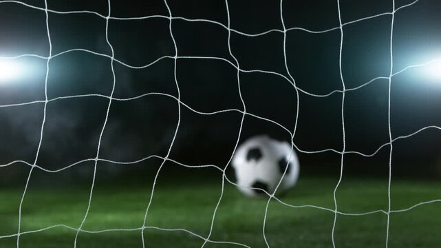 Close-up of Soccer Ball Hitting Goal Net, Super Slow Motion at 1000 fps. Filmed on High Speed Cinematic Camera.