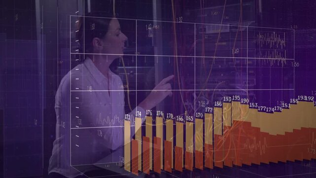 Vertical video: Woman checking rack in datacenter with laptop, cable pointing at charts, copy space