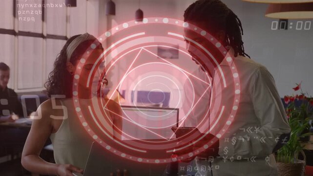 Vertical video: Diverse team holding laptop man with phone at work HUD pulsing while checking data