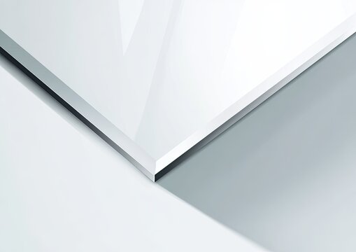 Sharp, angled perspective of a glossy, white surface. Light and shadow interplay