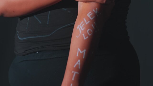 Artistic Expression on Arm with Text