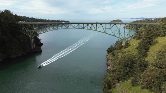 Aerial drone view of the famous Deception Pass Bridge. Deception Pass is the straight between Whidbey Island and Fidalgo Island. It is famous for its strong tidal current.