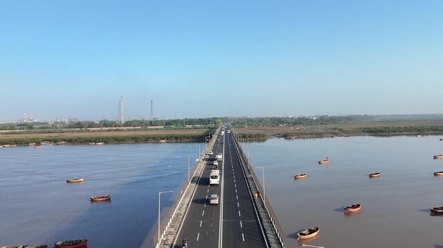 Top view of highway bridge crossing Tapi River with traffic movement in Surat Gujarat India