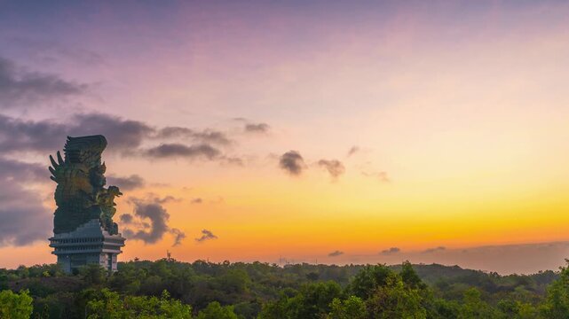 Bali famous landmark and popular travel destination 122-meter statue located in Garuda Wisnu Kencana Cultural GWK Park Bali, Indonesia 4K