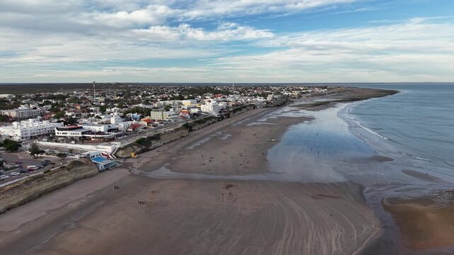 Low tide reflections at Las Grutas, a popular summer vacation destination.