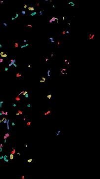 Super slow motion of flying confetti isolated on black background. Filmed on high speed cinema camera