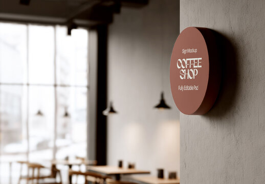 Round Coffee Shop Sign Mounted on Interior Wall Mockup