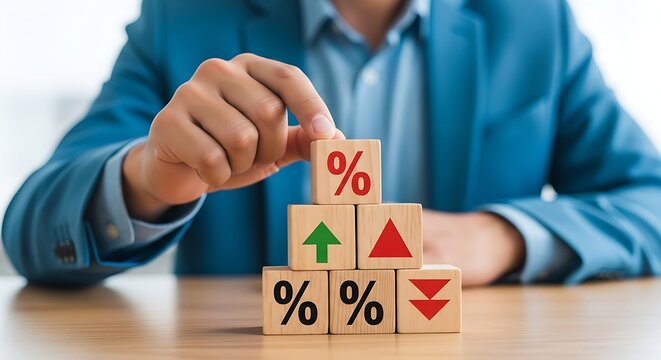 Businessman analyzing financial market trends with percentage blocks on a wooden table, symbolizing growth and investment strategy in a professional setting.