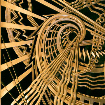 Black and gold Art Deco pattern with sweeping geometric lines