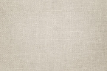 Linen fabric texture background in neutral beige color. Light beige textile background for packaging, design, banner and copy space. © Yuliia