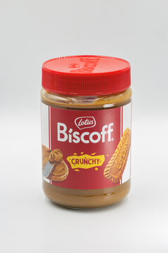 Lotus Biscoff crunchy spread jar closeup on white.