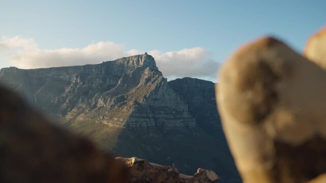 Sunrise Timelapse of Table Mountain with Clouds Rolling Over Plateau, Cinematic View from Lion's Head Peak Cape Town