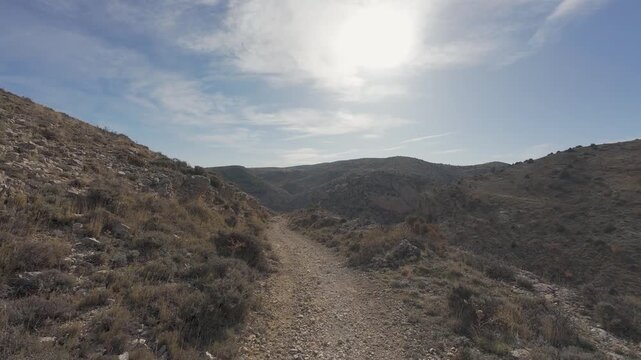 First person view hiking on mountain trail