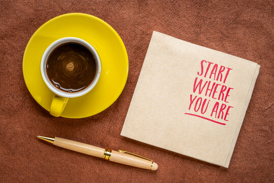 Start where you are advice - inspirational handwriting on a napkin with a cup of coffee