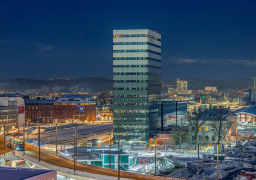Gothenburg, Sweden - January 11 2026: Modern city skyline at winter night with illuminated office tower.