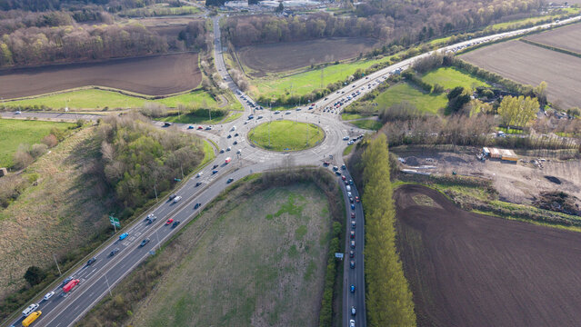 Commercial transport and logistics flow through the Sheriffhall junction in Midlothian. A wide perspective of the massive highway intersection on the Edinburgh City Bypass in Scotland